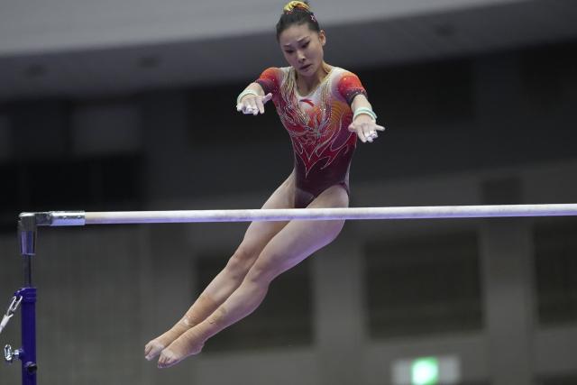(260923) -- NAGOYA, Sept. 23, 2026 (Xinhua) -- Du Siyu of China competes during the uneven bars competition of the women's team final of Artistic Gymnastics at the 20th Asian Games Aichi-Nagoya 2026 in Nagoya, Japan, Sept. 23, 2026. (Xinhua/Lui Siu Wai)