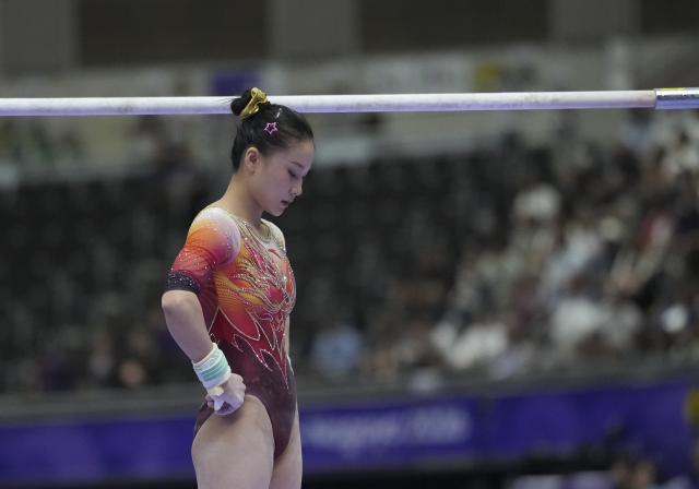 (260923) -- NAGOYA, Sept. 23, 2026 (Xinhua) -- Du Siyu of China reacts before the uneven bars competition of the women's team final of Artistic Gymnastics at the 20th Asian Games Aichi-Nagoya 2026 in Nagoya, Japan, Sept. 23, 2026. (Xinhua/Lui Siu Wai)