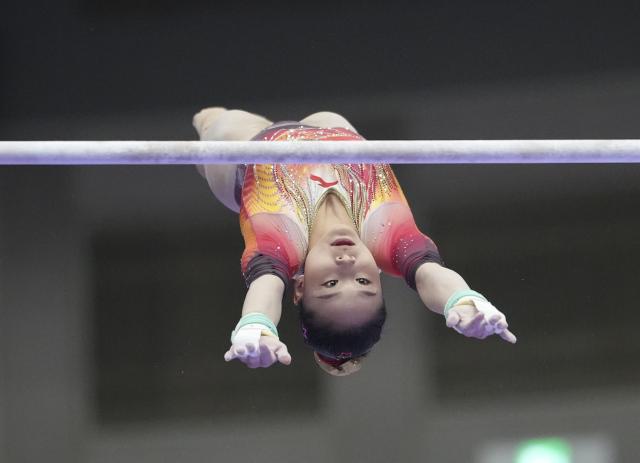 (260923) -- NAGOYA, Sept. 23, 2026 (Xinhua) -- Du Siyu of China competes during the uneven bars competition of the women's team final of Artistic Gymnastics at the 20th Asian Games Aichi-Nagoya 2026 in Nagoya, Japan, Sept. 23, 2026. (Xinhua/Lui Siu Wai)