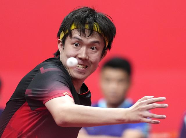(260923) -- TOYOTA, Sept. 23, 2026 (Xinhua) -- Wang Chuqin of China hits a return against Lin Yun-ju of Chinese Taipei during the men's team semifinal match between China and Chinese Taipei at the 20th Asian Games Aichi-Nagoya 2026 in Toyota of Aichi Prefecture, Japan, Sept. 23, 2026. (Xinhua/Cheong Kam Ka)