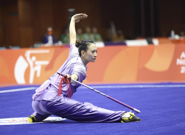 (260923) -- NAGOYA, Sept. 23, 2026 (Xinhua) -- Yao Yang of China competes during the Qiangshu round of the Women's Jianshu and Qiangshu Final of Wushu at the 20th Asian Games Aichi-Nagoya 2026 in Nagoya, Japan, Sept. 23, 2026. (Xinhua/Long Lei)