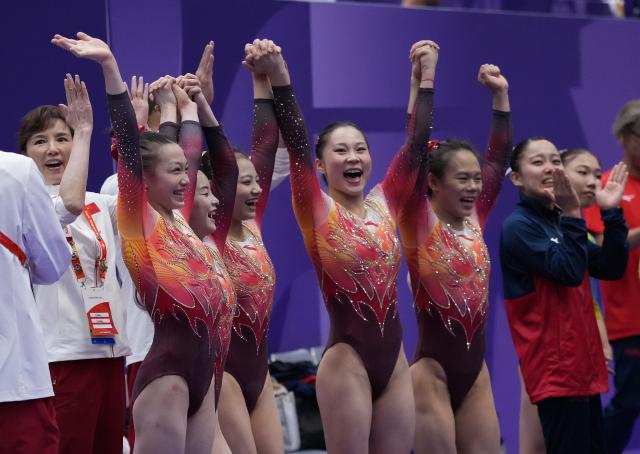 (260923) -- NAGOYA, Sept. 23, 2026 (Xinhua) -- Members of team China celebrate after the women's team final of Artistic Gymnastics at the 20th Asian Games Aichi-Nagoya 2026 in Nagoya, Japan, Sept. 23, 2026. (Xinhua/Jia Yuchen)