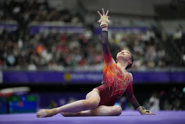 (260923) -- NAGOYA, Sept. 23, 2026 (Xinhua) -- Ke Qinqin of China competes during the floor exercise of the women's team final of Artistic Gymnastics at the 20th Asian Games Aichi-Nagoya 2026 in Nagoya, Japan, Sept. 23, 2026. (Xinhua/Lui Siu Wai)