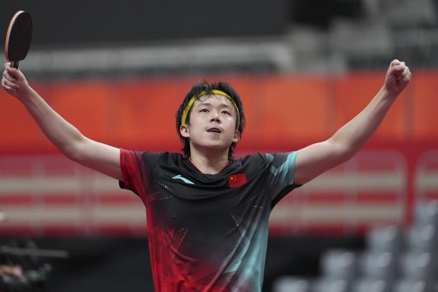 (260923) -- TOYOTA, Sept. 23, 2026 (Xinhua) -- Wang Chuqin of China celebrates against Lin Yun-ju of Chinese Taipei during the men's team semifinal match between China and Chinese Taipei at the 20th Asian Games Aichi-Nagoya 2026 in Toyota of Aichi Prefecture, Japan, Sept. 23, 2026. (Xinhua/Cheong Kam Ka)