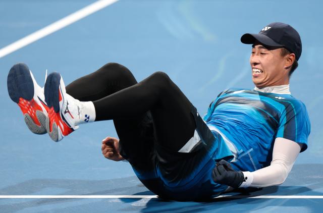 (260923) -- NAGOYA, Sept. 23, 2026 (Xinhua) -- Uematsu Toshiki (R) celebrates after the men's singles final of soft tennis between Uematsu Toshiki of Japan and Kurosaka Takuya of Japan at the 20th Asian Games Aichi-Nagoya 2026 in Nagoya, Japan, Sept. 23, 2026. (Xinhua/Deng Hua)