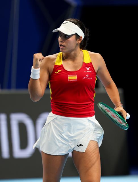 (260923) -- SHENZHEN, Sept. 23, 2026 (Xinhua) -- Jessica Bouzas Maneiro of Spain celebrates scoring against Sonja Zhiyenbayeva of Kazakhstan during the quarterfinal match between Kazakhstan and Spain at the 2026 Billie Jean King Cup Finals in Shenzhen, south China's Guangdong Province, Sept. 23, 2026. (Xinhua/Mao Siqian)