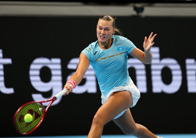 (260923) -- SHENZHEN, Sept. 23, 2026 (Xinhua) -- Sonja Zhiyenbayeva of Kazakhstan competes against Jessica Bouzas Maneiro of Spain during the quarterfinal match between Kazakhstan and Spain at the 2026 Billie Jean King Cup Finals in Shenzhen, south China's Guangdong Province, Sept. 23, 2026. (Xinhua/Mao Siqian)