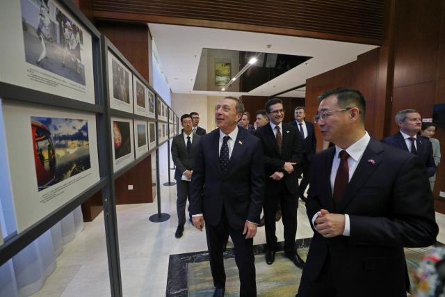 (260924) -- MINSK, Sept. 24, 2026 (Xinhua) -- Belarusian First Deputy Prime Minister Nikolai Snopkov (C) and Chinese Ambassador to Belarus Zhang Wenchuan (front, 1st R) visit a photo exhibition showcasing achievements of Chinese modernization, in Minsk, Belarus, Sept. 22, 2026. A photo exhibition showcasing achievements of Chinese modernization was held in the capital of Belarus on Tuesday.
   More than 400 representatives from the governments and various sectors of society of Belarus and China attended the event.
   The exhibition was held during a reception hosted by the Chinese Embassy in Belarus to celebrate the 77th anniversary of the founding of the People's Republic of China. It featured more than 40 selected Xinhua photographs presenting the great achievements of Chinese modernization under the leadership of the Communist Party of China from economic, social, cultural and ecological perspectives. (Xinhua/Henadz Zhinkov)