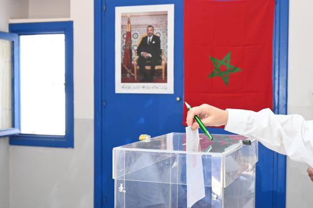 (260923) -- RABAT, Sept. 23, 2026 (Xinhua) -- A voter casts a ballot at a polling station in Rabat, Morocco, Sept. 23, 2026. Polling stations opened on Wednesday morning across Morocco for legislative elections to renew the 395 members of the House of Representatives, parliament's lower house. (Photo by Aissa/Xinhua)