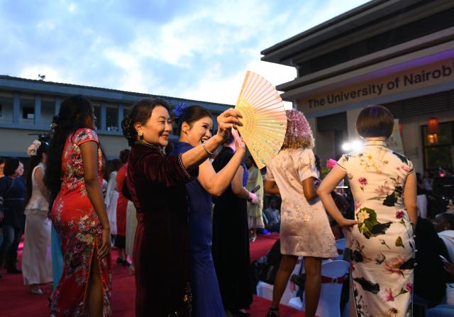 (260923) -- NAIROBI, Sept. 23, 2026 (Xinhua) -- People participate in the China-Africa Cultural Exchange Mid-Autumn Fashion Show in Nairobi, Kenya, Sept. 23, 2026. The China-Africa Cultural Exchange Mid-Autumn Fashion Show was held at the Confucius Institute of the University of Nairobi in Kenya on September 23. (Xinhua/Liu Qiong)