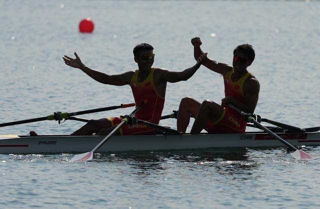(260924) -- NAGOYA, Sept. 24, 2026 (Xinhua) -- Nie Yide/Yi Xudi (R) of China celebrate after winning the Men's Double Sculls Final A of Rowing at the 20th Asian Games Aichi-Nagoya 2026 in Kaizu of Gifu Prefecture, Japan, Sept. 24, 2026. (Xinhua/Zhou Mi)