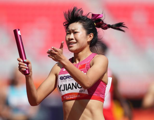 (260924) -- NAGOYA, Sept. 24, 2026 (Xinhua) -- Jiang Yutong of China reacts after the mixed 4X400m relay heats of Athletics at the 20th Asian Games Aichi-Nagoya 2026 in Nagoya, Japan, Sept. 24, 2026. (Xinhua/Lui Siu Wai)