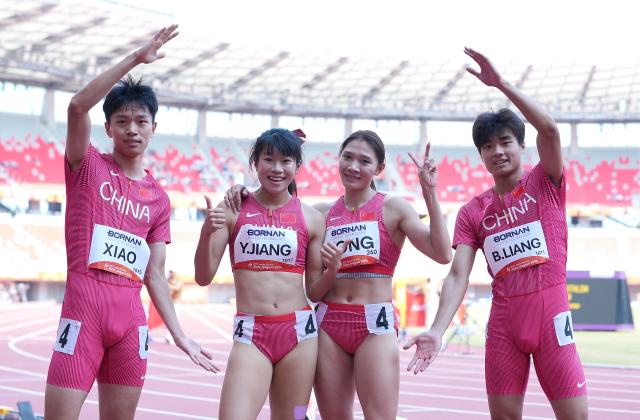 (260924) -- NAGOYA, Sept. 24, 2026 (Xinhua) -- (L to R)Xiao Heng, Jiang Yutong, Kong Yingying and Liang Baotang of China pose after the mixed 4X400m relay heats of Athletics at the 20th Asian Games Aichi-Nagoya 2026 in Nagoya, Japan, Sept. 24, 2026. (Xinhua/Lui Siu Wai)