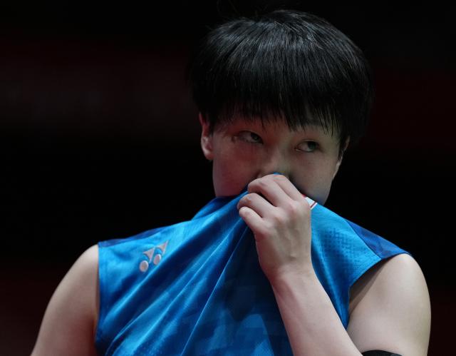 (260924) -- ICHINOMIYA, Sept. 24, 2026 (Xinhua) -- Yamaguchi Akane of team Japan reacts in the singles match against Wang Zhiyi of team China during the badminton women's team final between China and Japan at the 20th Asian Games Aichi-Nagoya 2026 in Ichinomiya of Aichi Prefecture, Japan, Sept. 24, 2026. (Xinhua/Hou Zhaokang)