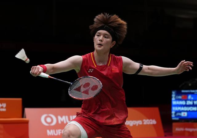 (260924) -- ICHINOMIYA, Sept. 24, 2026 (Xinhua) -- Wang Zhiyi of team China competes in the singles match against Yamaguchi Akane of team Japan during the badminton women's team final between China and Japan at the 20th Asian Games Aichi-Nagoya 2026 in Ichinomiya of Aichi Prefecture, Japan, Sept. 24, 2026. (Xinhua/Li Bo)