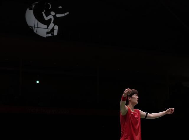 (260924) -- ICHINOMIYA, Sept. 24, 2026 (Xinhua) -- Wang Zhiyi of team China celebrates after winning the singles match against Yamaguchi Akane of team Japan during the badminton women's team final between China and Japan at the 20th Asian Games Aichi-Nagoya 2026 in Ichinomiya of Aichi Prefecture, Japan, Sept. 24, 2026. (Xinhua/Li Bo)