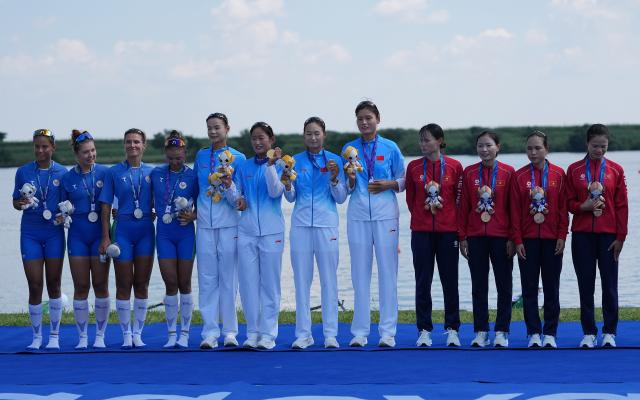 (260924) -- NAGOYA, Sept. 24, 2026 (Xinhua) -- Gold medalists team China (C), silver medalists team Uzbekistan (L) and bronze medalists team Vietnam pose during the victory ceremony for the Women's Four of Rowing at the 20th Asian Games Aichi-Nagoya 2026 in Kaizu of Gifu Prefecture, Japan, Sept. 24, 2026. (Xinhua/Zhou Mi)