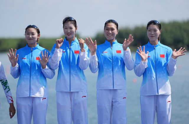 (260924) -- NAGOYA, Sept. 24, 2026 (Xinhua) -- Gold medalists Jiao Siyu, Li Yan, Xu Yixi and Han Mengyao (from L to R) react during the victory ceremony for the Women's Quadruple Sculls of Rowing at the 20th Asian Games Aichi-Nagoya 2026 in Kaizu of Gifu Prefecture, Japan, Sept. 24, 2026. (Xinhua/Zhou Mi)