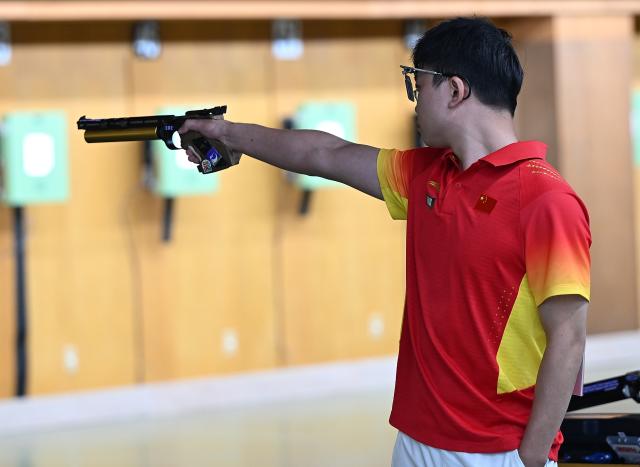 (260924) -- TOYOTA, Sept. 24, 2026 (Xinhua) -- Xie Yu of China competes during the 10m Air Pistol Men Team Final of shooting at the 20th Asian Games Aichi-Nagoya 2026 in Toyota of Aichi Prefecture, Japan, Sept. 24, 2026. (Xinhua/Liu Lei)