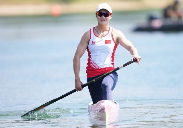 (260924) -- NAGOYA, Sept. 24, 2026 (Xinhua) -- Shuai Changwen of China reacts after the Women's Canoe Single 200m Final A of Canoe Sprint at the 20th Asian Games Aichi-Nagoya 2026 in Miyoshi of Aichi Prefecture, Japan, Sept. 24, 2026. (Xinhua/Luo Yuan)