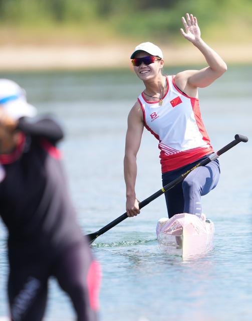 (260924) -- NAGOYA, Sept. 24, 2026 (Xinhua) -- Shuai Changwen of China reacts after the Women's Canoe Single 200m Final A of Canoe Sprint at the 20th Asian Games Aichi-Nagoya 2026 in Miyoshi of Aichi Prefecture, Japan, Sept. 24, 2026. (Xinhua/Luo Yuan)