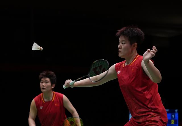 (260924) -- ICHINOMIYA, Sept. 24, 2026 (Xinhua) -- Liu Shengshu (R)/Tan Ning of team China compete in the doubles match against Fukushima Yuki/Matsumoto Mayu of team Japan during during the badminton women's team final between China and Japan at the 20th Asian Games Aichi-Nagoya 2026 in Ichinomiya of Aichi Prefecture, Japan, Sept. 24, 2026. (Xinhua/Li Bo)