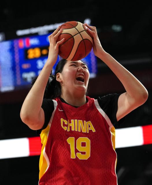 (260924) -- NAGOYA, Sept. 24, 2026 (Xinhua) -- Zhang Ziyu of China competes during the women's quarterfinal match between Mongolia and China at 20th Asian Games Aichi-Nagoya 2026 in Nagoya, Japan, Sept. 24, 2026. (Xinhua/Zhang Haobo)
