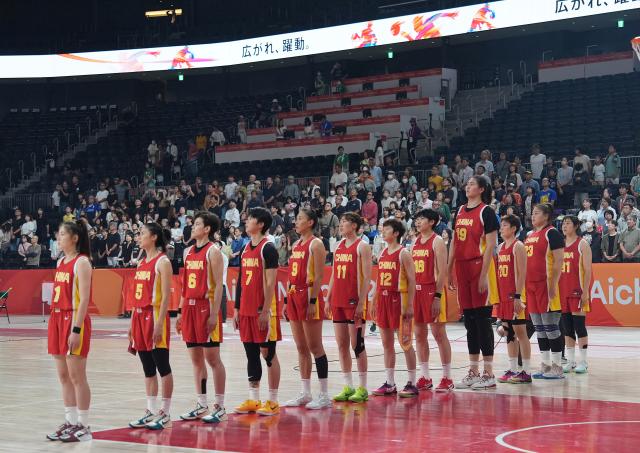 (260924) -- NAGOYA, Sept. 24, 2026 (Xinhua) -- Players of China line up before the women's quarterfinal match between Mongolia and China at 20th Asian Games Aichi-Nagoya 2026 in Nagoya, Japan, Sept. 24, 2026. (Xinhua/Zhang Haobo)