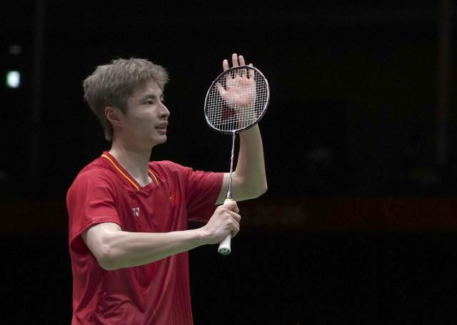 (260924) -- ICHINOMIYA, Sept. 24, 2026 (Xinhua) -- Shi Yuqi of China greets spectators after defeating Jonatan Christie of Indonesia during the men's team final of badminton between China and Indonesia at the 20th Asian Games Aichi-Nagoya 2026 in Ichinomiya of Aichi Prefecture, Japan, Sept. 24, 2026. (Xinhua/Li Bo)