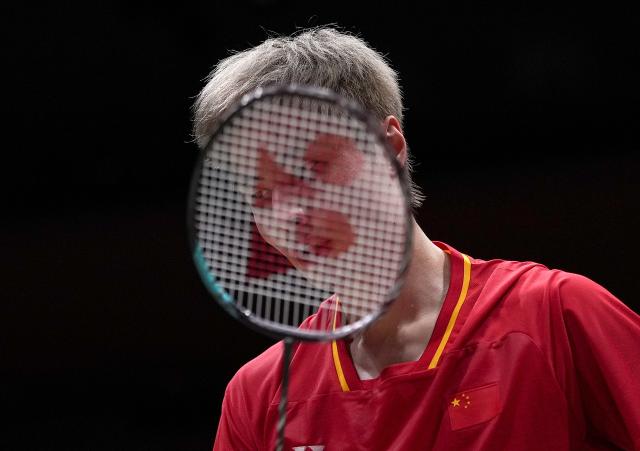 (260924) -- ICHINOMIYA, Sept. 24, 2026 (Xinhua) -- Shi Yuqi of China reacts as he competes with Jonatan Christie of Indonesia during the men's team final of badminton between China and Indonesia at the 20th Asian Games Aichi-Nagoya 2026 in Ichinomiya of Aichi Prefecture, Japan, Sept. 24, 2026. (Xinhua/Li Bo)