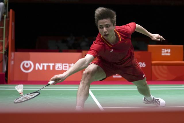 (260924) -- ICHINOMIYA, Sept. 24, 2026 (Xinhua) -- Shi Yuqi of China returns a shot to Jonatan Christie of Indonesia during the men's team final of badminton between China and Indonesia at the 20th Asian Games Aichi-Nagoya 2026 in Ichinomiya of Aichi Prefecture, Japan, Sept. 24, 2026. (Xinhua/Li Bo)