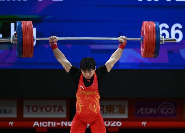 (260924) -- NAGOYA, Sept. 24, 2026 (Xinhua) -- Yang Yang of China competes during the men's 60kg final of weightlifting at the 20th Asian Games Aichi-Nagoya 2026 in Nagoya, Japan, Sept. 24, 2026. (Xinhua/Yu Yang)