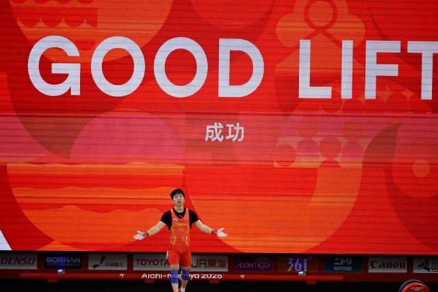 (260924) -- NAGOYA, Sept. 24, 2026 (Xinhua) -- Yang Yang of China celebratess during the men's 60kg final of weightlifting at the 20th Asian Games Aichi-Nagoya 2026 in Nagoya, Japan, Sept. 24, 2026. (Xinhua/Yu Yang)