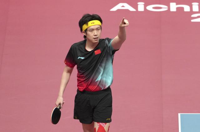 (260924) -- TOYOTA, Sept. 24, 2026 (Xinhua) -- Wang Chuqin of China celebrates after competing with Matsushima Sora of Japan during the men's team final of table tennis between China and Japan at the 20th Asian Games Aichi-Nagoya 2026 in Toyota of Aichi Prefecture, Japan, Sept. 24, 2026. (Xinhua/Wang Fei)