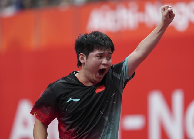 (260924) -- TOYOTA, Sept. 24, 2026 (Xinhua) -- Lin Shidong of China celebrates while competing with Togami Shunsuke of Japan during the men's team final of table tennis between China and Japan at the 20th Asian Games Aichi-Nagoya 2026 in Toyota of Aichi Prefecture, Japan, Sept. 24, 2026. (Xinhua/Cheong Kam Ka)