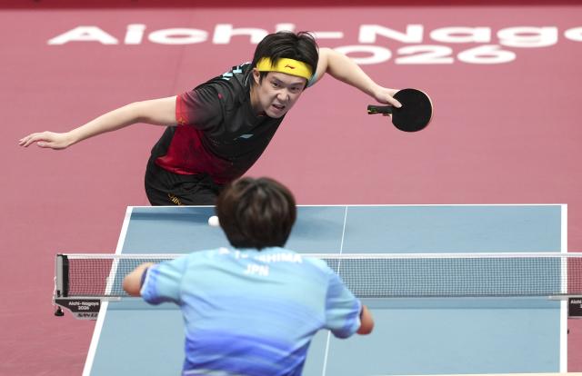 (260924) -- TOYOTA, Sept. 24, 2026 (Xinhua) -- Wang Chuqin (back) of China competes against Matsushima Sora of Japan during the men's team final match between China and Japan at the 20th Asian Games Aichi-Nagoya 2026 in Toyota of Aichi Prefecture, Japan, Sept. 24, 2026. (Xinhua/Wang Fei)