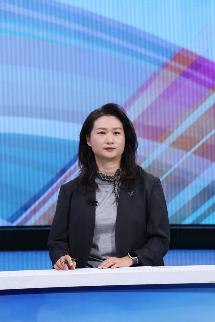 (260924) -- BEIJING, Sept. 24, 2026 (Xinhua) -- Zhang Dandan, head of the Changsha New Consumption Research Institute, speaks at the 37th episode of China Economic Roundtable, an all-media talk show hosted by Xinhua News Agency. (Xinhua/Zhang Fan)
