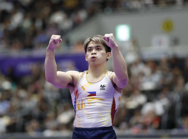 (260924) -- NAGOYA, Sept. 24, 2026 (Xinhua) -- Carlos Edriel Yulo of the Philippines reacts during the men's floor exercise final of Artistic Gymnastics at the 20th Asian Games Aichi-Nagoya 2026 in Nagoya, Japan, Sept. 24, 2026. (Xinhua/Wang Lili)