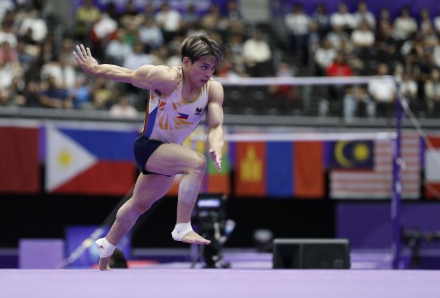 (260924) -- NAGOYA, Sept. 24, 2026 (Xinhua) -- Carlos Edriel Yulo of the Philippines competes during the men's floor exercise final of Artistic Gymnastics at the 20th Asian Games Aichi-Nagoya 2026 in Nagoya, Japan, Sept. 24, 2026. (Xinhua/Wang Lili)