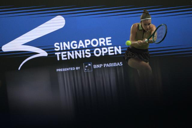 (260924) -- SINGAPORE, Sept. 24, 2026 (Xinhua) -- Tatiana Prozorova of Russia hits a return to Alexandra Eala of the Philippines during the women's singles round of 16 match at the WTA 500 Singapore Open in Singapore, Sept. 24, 2026. (Xinhua/Then Chih Wey)