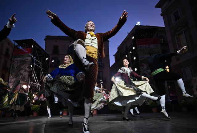 (260925) -- BEIJING, Sept. 25, 2026 (Xinhua) -- Artists perform during the opening ceremony of the La Merce festival in Barcelona, Spain, Sept. 23, 2026. La Merce, Barcelona's largest annual city festival, opened here on Wednesday. (Xinhua/Cheng Min)