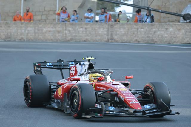 (260925) -- BAKU, Sept. 25, 2026 (Xinhua) -- Ferrari's Lewis Hamilton of Britain competes during the practice session of the Formula One Azerbaijan Grand Prix at the Baku City Circuit in Baku, capital of Azerbaijan, Sept. 24, 2026. (Xinhua/Chen Junfeng)