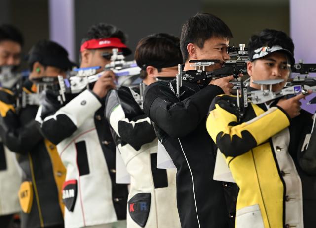 (260925) -- TOYOTA, Sept. 25, 2026 (Xinhua) -- Shooters compete during the 50m rifle 3 positions men team final of shooting at the 20th Asian Games Aichi-Nagoya 2026 in Toyota of Aichi Prefecture, Japan, Sept. 25, 2026. (Xinhua/Liu Lei)