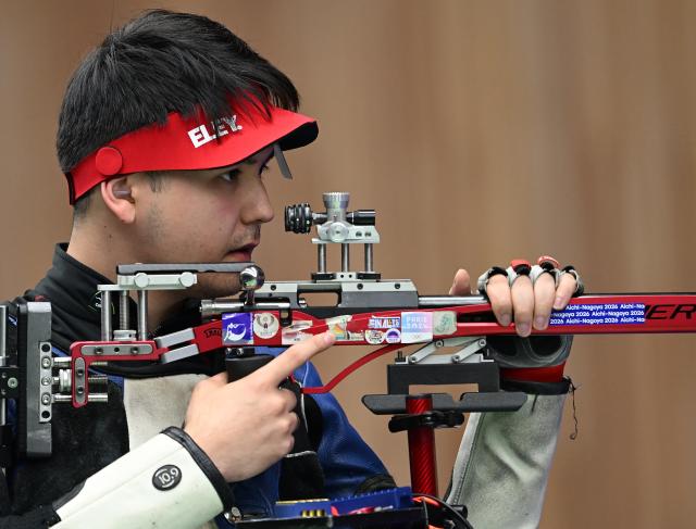 (260925) -- TOYOTA, Sept. 25, 2026 (Xinhua) -- Islam Satpayev of Kazakhstan reacts during the 50m rifle 3 positions men individual final of shooting at the 20th Asian Games Aichi-Nagoya 2026 in Toyota of Aichi Prefecture, Japan, Sept. 25, 2026. (Xinhua/Liu Lei)