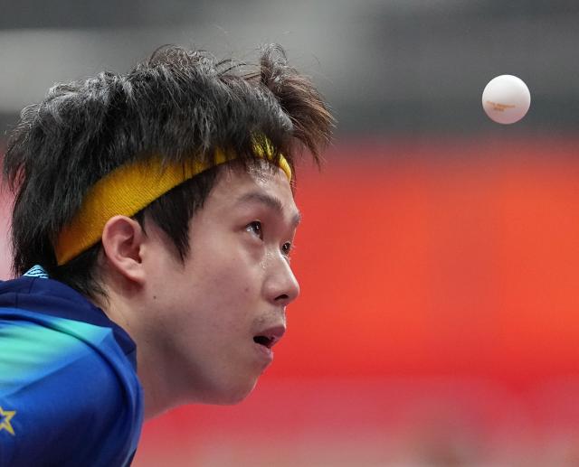(260925) -- TOYOTA, Sept. 25, 2026 (Xinhua) -- Wang Chuqin of China competes during the table tennis men's singles round 2 match against Thitaphat Preechayan of Thailand at the 20th Asian Games Aichi-Nagoya 2026 in Toyota of Aichi Prefecture, Japan, Sept. 25, 2026. (Xinhua/Cheong Kam Ka)