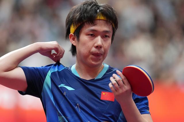 (260925) -- TOYOTA, Sept. 25, 2026 (Xinhua) -- Wang Chuqin of China reacts during the table tennis men's singles round 2 match against Thitaphat Preechayan of Thailand at the 20th Asian Games Aichi-Nagoya 2026 in Toyota of Aichi Prefecture, Japan, Sept. 25, 2026. (Xinhua/Cheong Kam Ka)