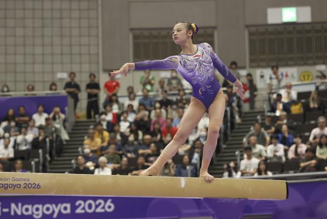 (260925) -- NAGOYA, Sept. 25, 2026 (Xinhua) -- Qiu Qiyuan of China competes during the women's balance beam final of Artistic Gymnastics at the 20th Asian Games Aichi-Nagoya 2026 in Nagoya, Japan, Sept. 25, 2026. (Xinhua/Xu Yanan)