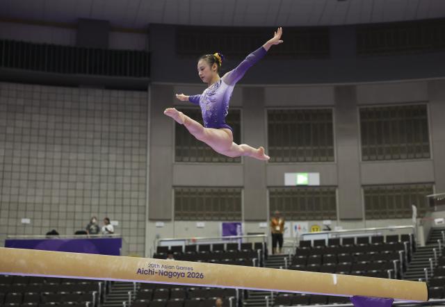 (260925) -- NAGOYA, Sept. 25, 2026 (Xinhua) -- Qiu Qiyuan of China competes during the women's balance beam final of Artistic Gymnastics at the 20th Asian Games Aichi-Nagoya 2026 in Nagoya, Japan, Sept. 25, 2026. (Xinhua/Xu Yanan)