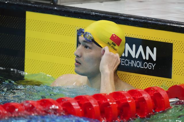 (260925) -- TOKYO, Sept. 25, 2026 (Xinhua) -- Xu Jiayu of China reacts after the men's 200m backstroke final at the 20th Asian Games Aichi-Nagoya 2026 in Tokyo, Japan, Sept. 25, 2026. (Xinhua/Chen Zeguo)