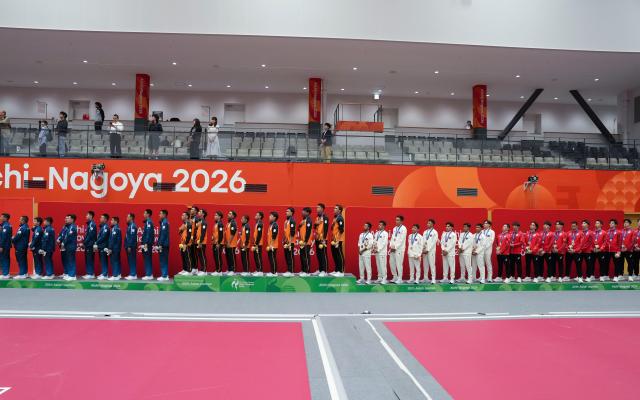 (260925) -- NAGOYA, Sept. 25, 2026 (Xinhua) -- Gold medalist team Malaysia (2nd L), silver medalist team Thailand (1st L), bronze medalists team Indonesia (2nd R) and team Japan pose for photos during the awarding ceremony for the men's team regu of Sepaktakraw at the 20th Asian Games Aichi-Nagoya 2026 in Nagoya, Japan, Sept. 25, 2026. (Xinhua/Wang Fei)